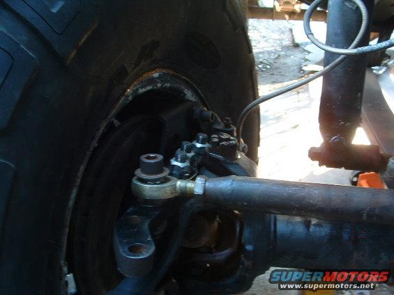 1994 Jeep YJ front wheel steering linkage with tie rod end and shock absorber