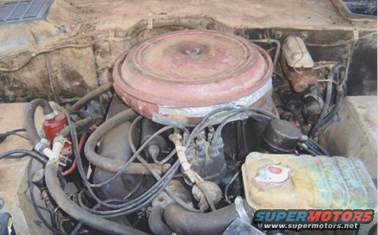67-bronco1-010.jpg Heres one of the motor, what a mess.