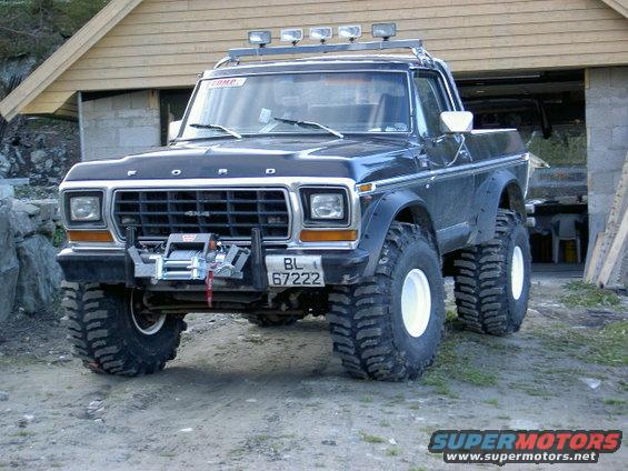 Lifted Ford Bronco with big tires and a winch on the front bumper