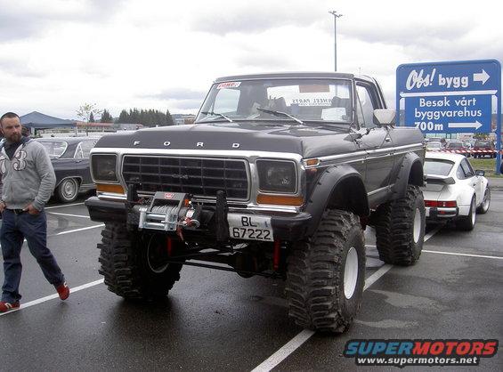 Black 1979 Ford Bronco with winch and oversized tires