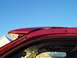 2003 Ford Excursion - Pulled away weatherstripping showing the 3 side screws