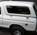 1978 Ford Bronco - Side view of a 1978 Ford Bronco, showing its distinctive body style and aftermarket hardtop.
