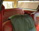 1978 Ford Bronco - Interior view of a 1978 Ford Bronco, red seats with distinctive plaid upholstery.