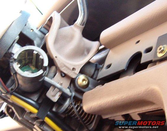 16leveron.jpg Install the lever & pin, and then clip the boot down.