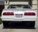 1978 Ford Mustang II - Rear view of a white 1978 Ford Mustang II parked in a driveway.