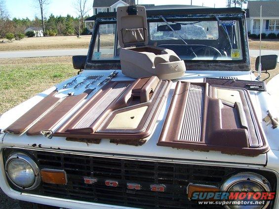 Ford Bronco with interior door panels and a center console on the hood