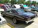 1967 Pontiac Lemans - at a summit racing show, the sun shows the dark cherry paint.