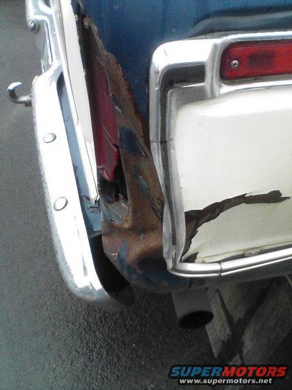 1978 Ford Bronco rear corner with damaged taillight and bumper