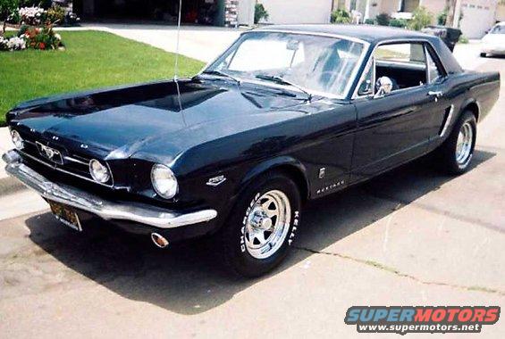 Black 1965 Ford Mustang coupe, 3/4 front view
