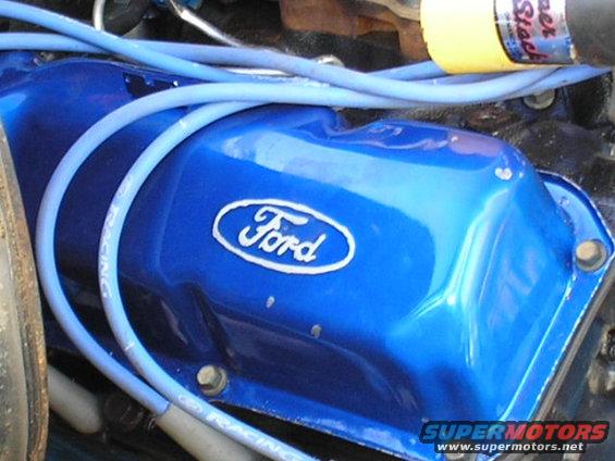 Blue Ford valve cover with spark plug wires