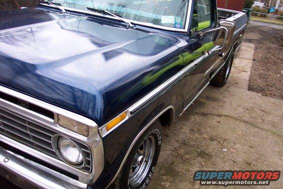 Dark blue 1975 Ford F-150 pickup truck, 3/4 front view