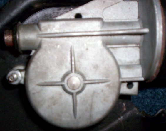 tailgate-window-motor.jpg Closeup of the Window Tailgate Motor's mounting holes. Not sure what type of hardware attaches this to the window regulator. I recommend to tap the holes out and use bolts that match the tap for installation. 