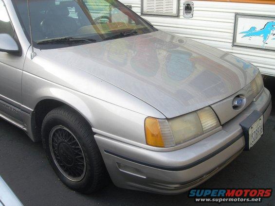 Silver 1991 Ford Taurus front view