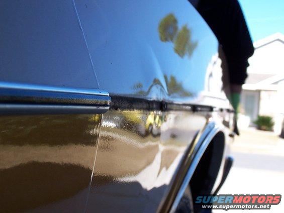 100_0391.jpg 3rd shot of dent site.  75% hammered out.