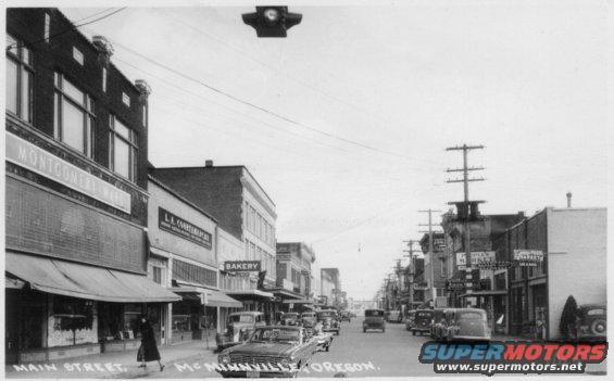 Street scene with cars and buildings, "Main Street, McMinnville, Oregon" text visible