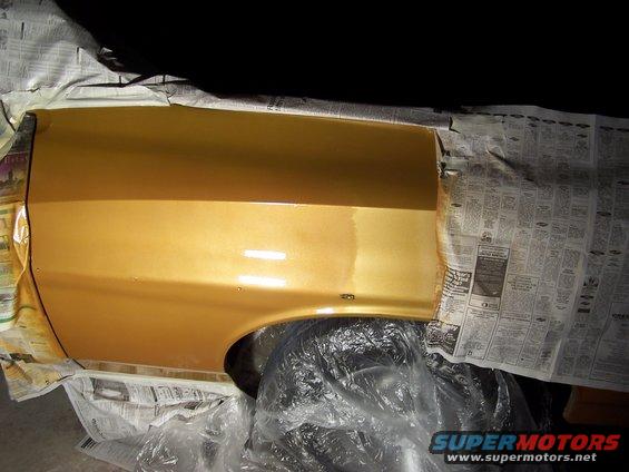 100_0408.jpg Final pass of 2nd clear coat on dent site.  Dent 99% repaired.  PPG Colorado Gold not color matched well enough.  I like the new color so much I'm going to reshoot the whole car with this color.
