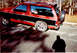 1989 Chevrolet S10 - This 1989 Chevrolet S10 Blazer has a two-tone red and black paint scheme with a spare tire on the back.