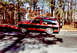 1989 Chevrolet S10 - A two-tone red and black SUV is seen from the side, mounted on a red trailer.