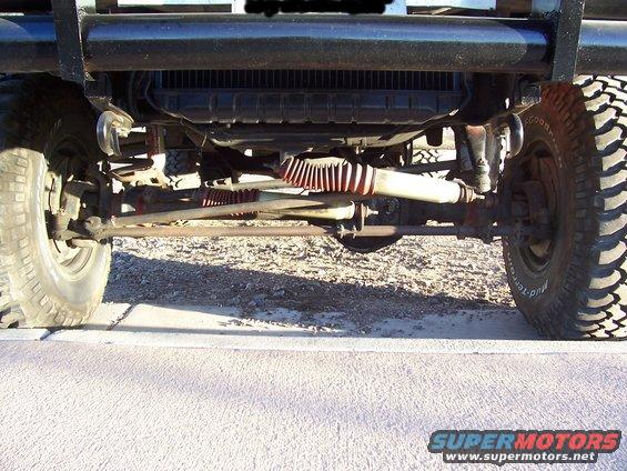 1978 Ford Bronco front suspension with steering linkage and radiator visible