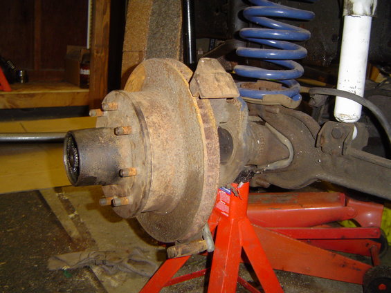 Back side

Finishing up would be just putting on the locking hub, and the caliper, but i dont even have a master cylinder yet so why bother.

(i needed the 5 lug stuff from this for another project )