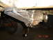1982 Nissan Titan - Custom bracketry is welded to the frame and attached to the rear differential housing.