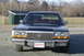 1991 Ford Crown Victoria - This 1991 Ford Crown Victoria is seen from the front, its distinctive chrome grille and a Massachusetts license plate.