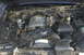 1991 Ford Crown Victoria - The engine bay of a 1991 Ford Crown Victoria is visible, with the V8 engine and associated components clearly depicted.