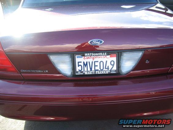 Maroon 2005 Ford Crown Victoria LX rear view with California license plate 5MVE049