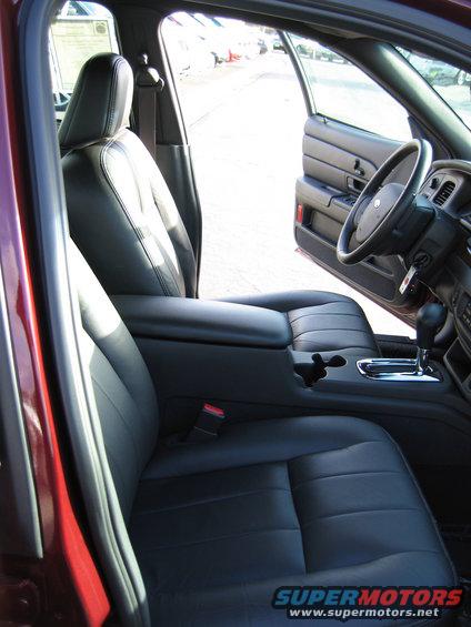 2005 Ford Crown Victoria interior showing front seats, center console, and steering wheel