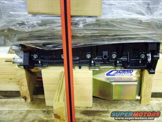 Engine block with Canton Racing Products oil pan, secured with wooden blocks and straps