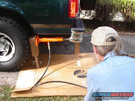 Jims pumpin it now with a better postion to monitor the progress of the bumper as it bends in the right direction.