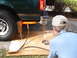1995 Ford Bronco - Jims pumpin it now with a better postion to monitor the progress of the bumper as it bends in the right direction.