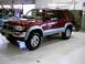1996 Toyota 4Runner - Maroon 1996 Toyota 4Runner parked indoors, showing its 3q front profile.