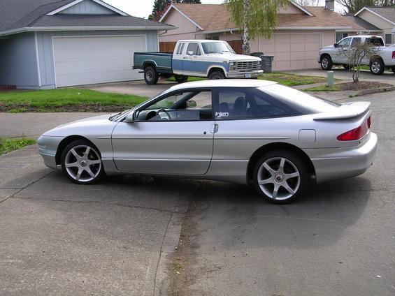 Silver 1996 Ford Probe coupe, side view