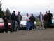 1996 Ford Probe - A group poses with their 1996 Ford Probe and other vehicles.