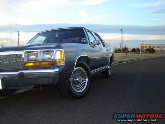 1988 Ford Crown Victoria LTD parked on asphalt road, front quarter view