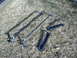 1979 Ford Bronco - Roof rack components are displayed on the ground, likely for sale or installation.