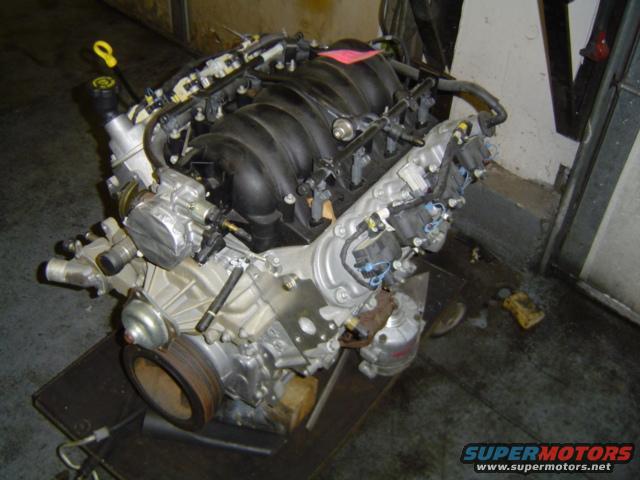 Engine assembly with black intake manifold and silver block