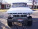 1978 Ford Bronco - This Ford F-Series truck, likely from the early to mid-1970s, features a prominent grille and a custom front bumper.