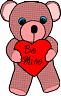 Pink teddy bear holding a red heart with 'Be Mine' written on it