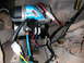 1984 Ford Bronco - Close-up of an ARB Air Compressor installation with visible wiring and tubing.