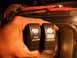 1984 Ford Bronco - Two ARB switches are held up, one for a front air locker and the other for an air compressor.