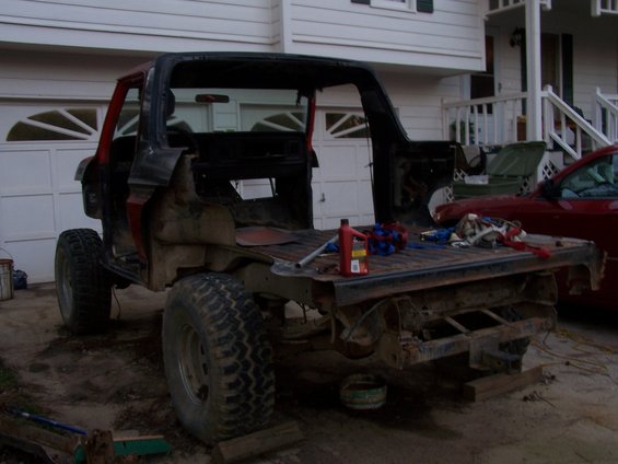 1979 Ford F-150 pickup truck bed removed from cab, sitting on frame