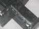 1991 Ford Bronco - This is a close-up view of a welded metal bracket, showing the weld seams.