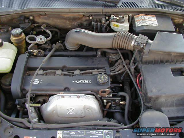 Ford 1.8L Zetec engine bay with air intake and various hoses