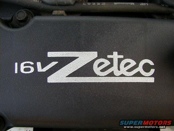 Black engine cover with white '16V Zetec' text