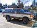 1987 Ford Bronco - Side view of a 1987 Ford Bronco XLT with aftermarket wheels and tires.