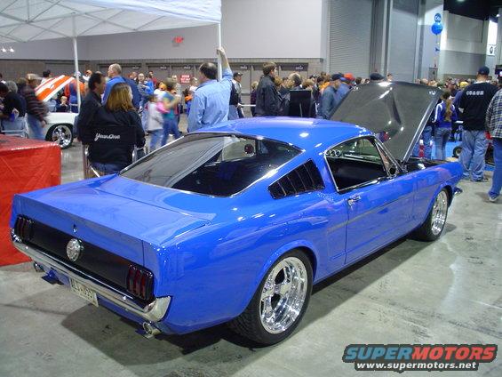 Blue 1965 Mustang coupe, rear 3/4 view, hood open
