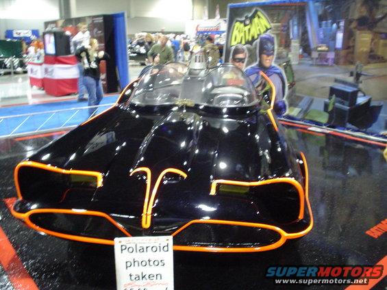 Black Batmobile with orange trim, front view
