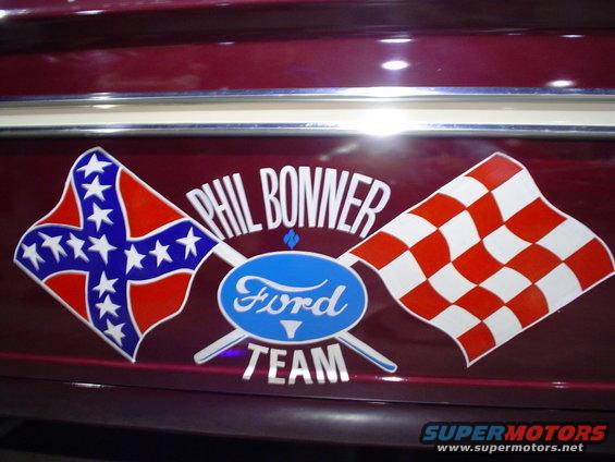 Ford Team decal with Phil Bonner name, Confederate flag, and checkered flag on maroon vehicle